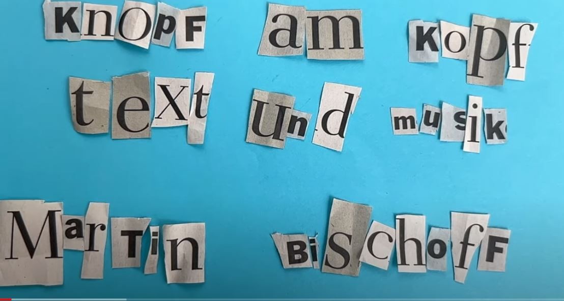 Video zu „Knopf am Kopf"